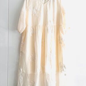 Charming Cream Dress with Floral Details